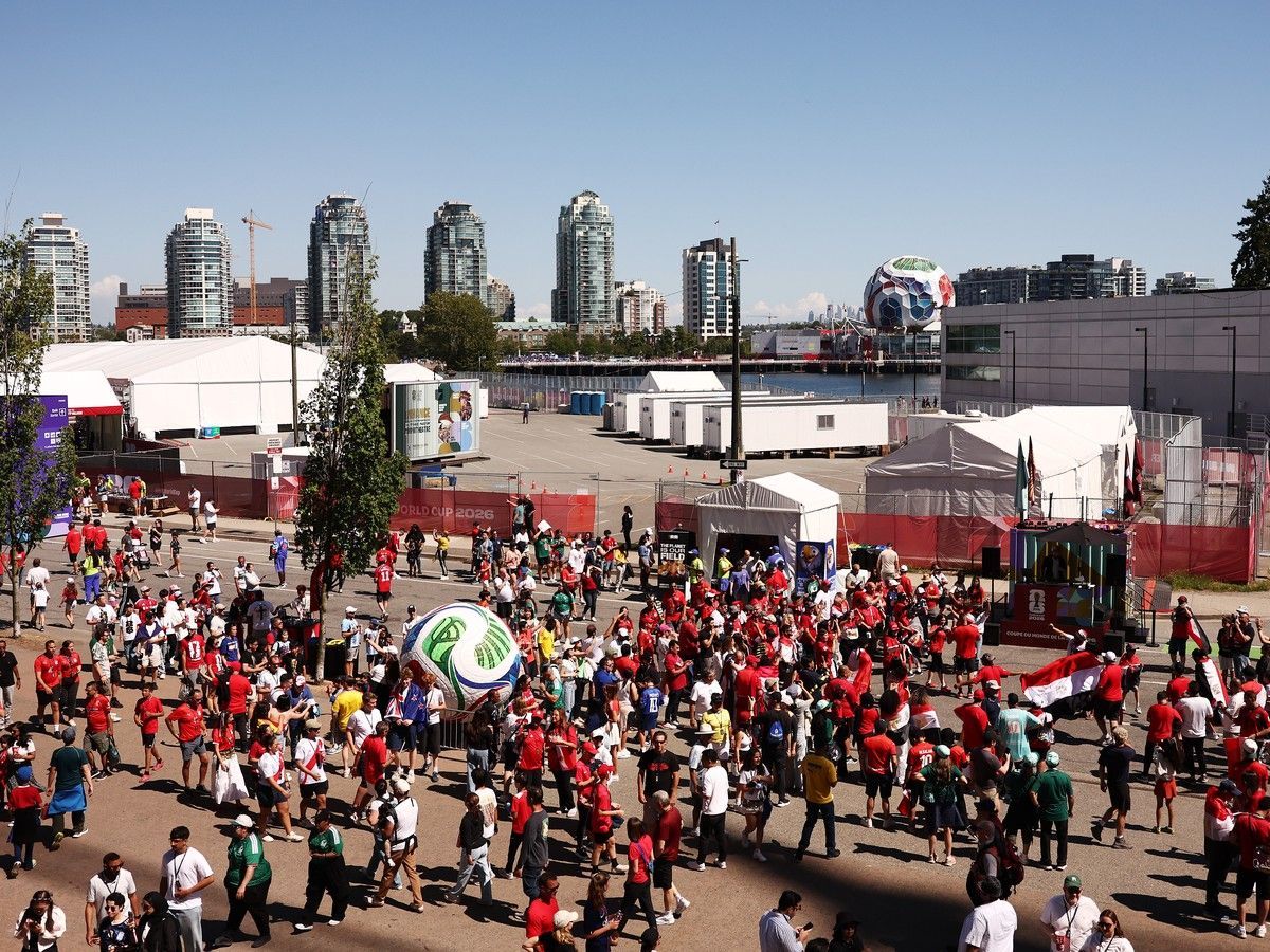 Fans arrive before the World Cup Group G match between New Zealand and Egypt at B.C. Place on June 21. That night Vancouverites, with no stake in the match, would take photographs with strangers draped in Egyptian flags, learning chants on the spot and laughing into phones that weren't theirs, writes Osama Elemary.