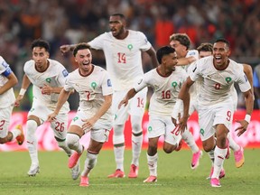 Players of Morocco dash as Ismael Saibari #11 of Morocco scores the team's fifth and winning penalty during hte penalty shootout in the FIFA World Cup 2026 Round of 32 match between Netherlands and Morocco at Monterrey Stadium on June 29, 2026 in Guadalupe, Mexico.