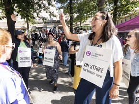 Nurses take to the picket line in front of Vancouver General Hospital on July 7.