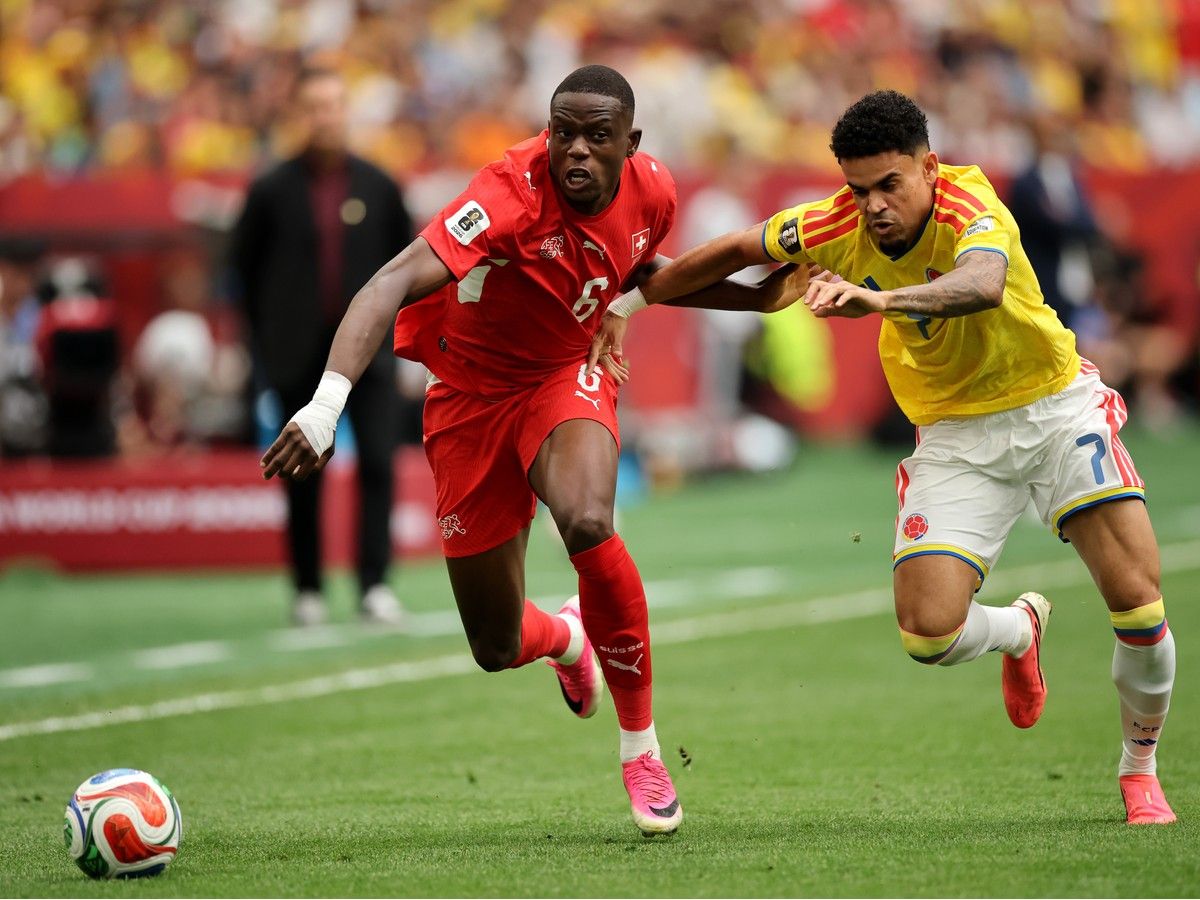 VANCOUVER, CANADA - JULY 07: Denis Zakaria #6 of Switzerland competes for the ball against Luis Diaz #7 of Colombia during the FIFA World Cup 2026 Round of 16 match between Switzerland and Colombia at BC Place Vancouver on July 07, 2026 in Vancouver, British Columbia, Canada.