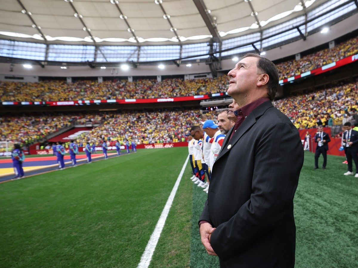 VANCOUVER, CANADA - JULY 07: Nestor Lorenzo, Head Coach of Colombia, lines up for the national anthem before the FIFA World Cup 2026 Round of 16 match between Switzerland and Colombia at BC Place Vancouver on July 07, 2026 in Vancouver, British Columbia, Canada.