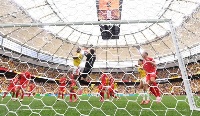Kobel of Switzerland makes a save against Jhon Lucumi of Colombia during the FIFA World Cup 2026 Round of 16 match between Switzerland and Colombia at B.C. Place Vancouver on July 7, 2026.