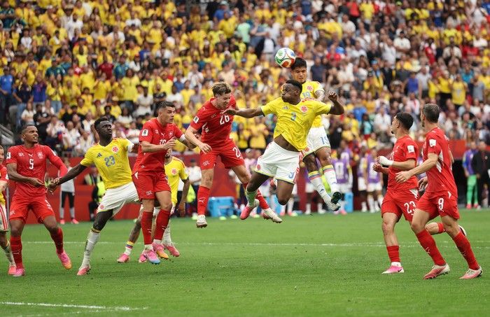 Cucho Hernandez and Jhon Lucumi of Colombia attempt a header during the FIFA World Cup 2026 Round of 16 match between Switzerland and Colombia at B.C. Place Vancouver on July 7, 2026.
