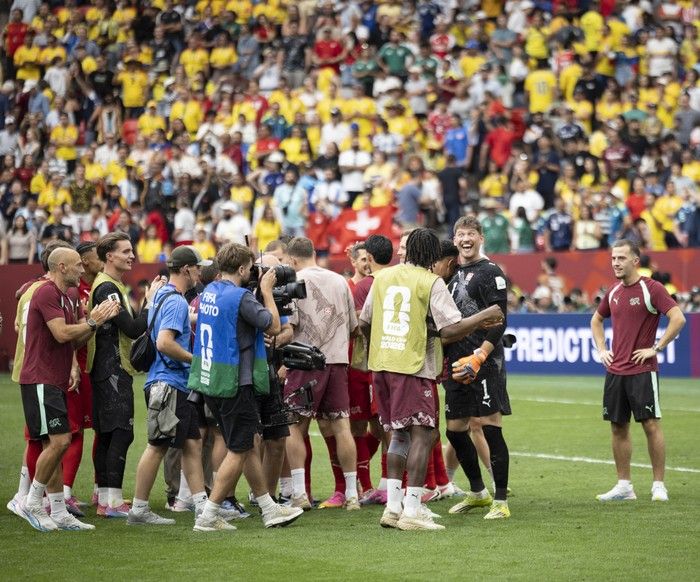 Switzerland goalkeeper Gregor Kobel (right) with teammates after Switzerland won in a shoot-out against Colombia in Vancouver during the FIFA World Cup 2026 elimination round Tuesday, July 7, 2026.