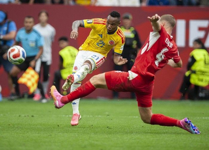Switzerland's Nico Elvedi blocks a shot by Colombia's Jaminton Campaz in play between Switzerland and Colombia in Vancouver during the FIFA World Cup 2026 elimination round Tuesday, July 7, 2026.