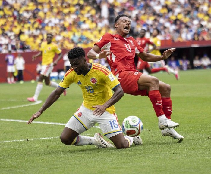 Colombia's Jefferson Lerma (left) collides with Switzerland's Dan Ndoye during the first half of play between Switzerland and Colombia in Vancouver during the FIFA World Cup 2026 elimination round Tuesday, July 7, 2026.