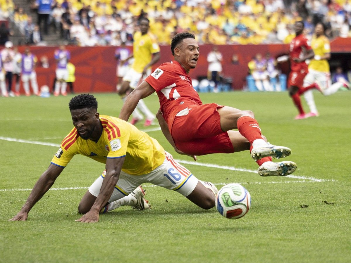 Colombia's Jefferson Lerma (left) collides with Switzerland's Dan Ndoye during the first half of play between Switzerland and Colombia in Vancouver during the FIFA World Cup 2026 elimination round Tuesday, July 7, 2026.