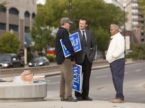 SASKATOON, SASK - September 19, 2012 - Mayoral candidate Tom Wolf and his supporters were campaigning at the base of University Bridge early Wednesday. Photo by Andrew Spearin / The StarPhoenix