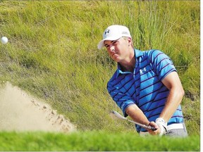 American Jordan Spieth plays his bunker shot on the 18th hole during second-round action Friday at the PGA Championship at Whistling Straits in Kohler, Wis. Spieth shot a 5-under 67 to move within three shots of the lead.