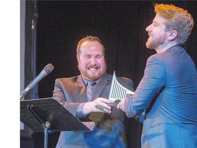 Andrew Taylor, right, and Donovan Scheirer, of Two Unruly Gentlemen, who produced Two Corpses Go Dancing, accept the award for Outstanding Ensemble Monday.