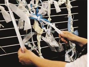 Artist Meg Saligman shows knots tied to a mock-up of an art installation at her studio in Philadelphia. The installation will greet Pope Francis and millions of others this fall.