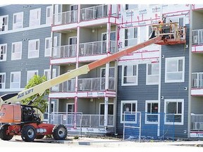 In August, work on 93 multiple-unit residential buildings, such as this one in Harbour Landing, made up the bulk of the month's 145 housing starts.