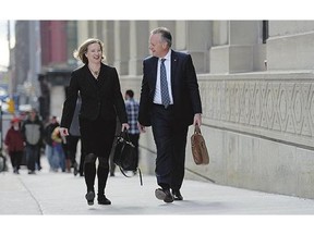 Bank of Canada Governor Stephen Poloz and Senior Deputy Governor Carolyn Wilkins head to a news conference at the National Press Theatre in Ottawa on Wednesday.