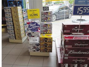 Beer sits on display inside a store in Drummondville, Que. New Brunswick resident Gerard Comeau is mounting a constitutional challenge after he was charged with illegally importing alcohol into New Brunswick from neighbouring Quebec.