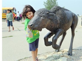 Nadia Halkett and other evacuees spenrt time at Wanuskewin Heritage Park on Tuesday.