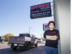 Arlene Wiciniski, owner of Offside HairZone, poses for a photograph outside her business on Wednesday, September 30th, 2015. Wiciniski  is one of a number of business owner along Central Avenue concerned about how new paid on-street parking will affect their businesses.