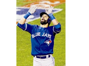 Blue Jays' Jose Bautista celebrates his two-run home run against the Royals during Game 6 in Kansas City on Friday. The Jays lost 4-3 to the Kansas City Royals and the series 4-2.
