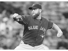 Blue Jays starting pitcher Mark Buehrle works in the first inning against the Braves in Atlanta on Tuesday. He may start Sunday against the Red Sox.