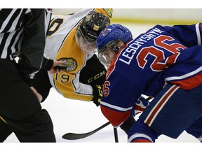 Brandon Wheat Kings forward Nolan Patrick and Regina Pats forward Jake Leschyshyn face-off at an exhibition game held at the Co-operators Centre in Regina, Sask. on Saturday Sep. 12, 2015.