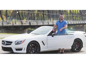 Brenon MacNeil, sales manager at MacNeil Motors in Martensville, with a $190,000 Mercedes SL63 AMG at River Landing on Thursday .