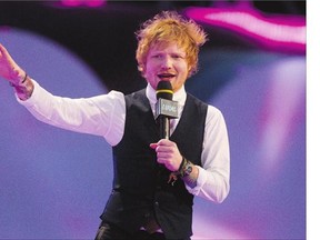 British singer Ed Sheeran hosted and picked up a pair of prizes at the Much Music Video Awards in Toronto on Sunday.