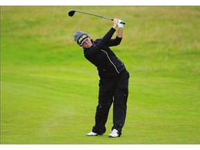 Brooke Henderson of Smiths Falls, Ont. hits a shot on the 17th hole during second-round action at the Ricoh Women's British Open at Turnberry Golf Club in Scotland on Friday. She and Hamilton, Ont.'s Alena Sharp made the 36-hole cut.