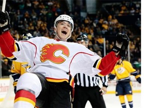 Calgary Flames left wing Michael Ferland celebrates after scoring a goal against the Nashville Predators in the second period of an NHL hockey game Sunday, March 29, 2015, in Nashville, Tenn. (AP Photo/Mark Humphrey)