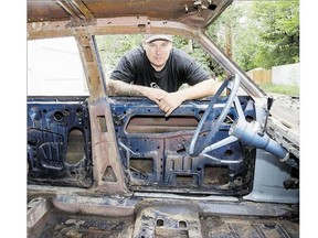 Calvin Heilman looks through the 1966 Ford Custom he's fixing up for a demolition derby at The Ex this weekend.