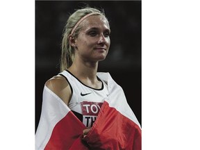 Canada's Brianne Theisen-Eaton managed to salvage a women's heptathlon silver at the World Athletics Championships at the "Bird's Nest" National Stadium in Beijing Sunday.