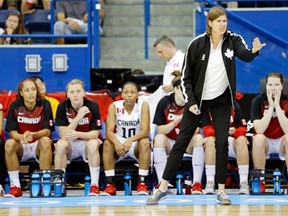 Canada head coach Lisa Thomaidis directs her players in the first half of a women’s preliminary round basketball game against Venezuela at the Pan Am Games Thursday, July 16, 2015, in Toronto. Canada won 101-38.