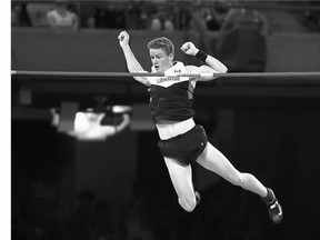Canada's Shawn Barber competes in the final of the men's pole vault at the IAAF World Championships in Beijing on Monday. Barber cleared 5.90 metres to win gold.