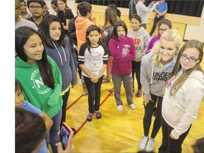 Canadian women's soccer Olympian Kaylyn Kyle, who grew up in Saskatoon, meets with parents and students in Ile à la Crosse on Monday.