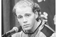 Chicago Blackhawks' Patrick Kane listens during a media availability on the first day of training camp Thursday. The Blackhawks' star is attending camp despite being the subject of a grand jury investigation of an alleged sexual assault.