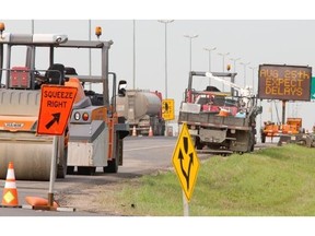 City of Saskatoon director of transportation Angela Gardiner and Saskatoon Police Service Staff Sgt. Judy McHarg spoke about construction zone safety at Diefenbaker Drive and 22nd Street West. where repaving was taking place on August 27, 2015. (Gord Waldner / TheStarPhoenix)