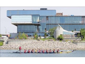 Competitors race during the FMG Dragon Boat Festival fundraising event at Rotary Park on Saturday.