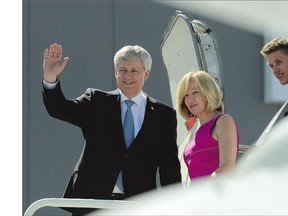Conservative Leader Stephen Harper, his wife Laureen and son Ben arrive in Edmonton, Wednesday. Emails tabled at the fraud trial of suspended Sen. Mike Duffy show Harper's former chief of staff Nigel Wright and his team tried to curb further Senate investigations into expense claims.
