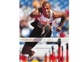 Damian Warner, of London, Ont., competes in the 110m hurdles in the men's decathlon at the 2015 Pan Am Games in Toronto on Thursday.
