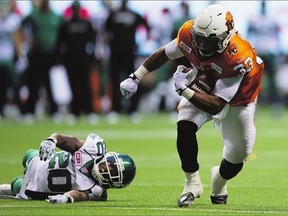 Defensive struggles have contributed to the Saskatchewan Roughriders' 0-3 start to the 2015 season. The latest setback was a 35-32 overtime loss to the host B.C. Lions on Friday, in which Lions tailback Andrew Harris - shown escaping defensive back Terrell Maze, left - had 144 yards from scrimmage.