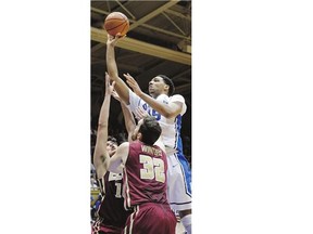 Duke's Jahlil Okafor, top, is projected to go among the top three in the NBA entry draft scheduled Thursday in Brooklyn, N.Y. His most likely destination is No. 2 with the Los Angeles Lakers.