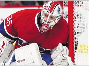 Dustin Tokarski of the Montreal Canadiens defends the net against the New York Rangers during the 2014 NHL Stanley Cup Playoffs.