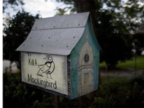 A birdhouse sits near the town square in the hometown of "To Kill a Mockingbird" author Harper Lee, Monday, July 13, 2015, in Monroeville, Ala. "Go Set a Watchman" is set for release July 14, 2015, and town officials are hoping the new novel draws more visitors to the quiet town of 6,300 people. (AP Photo/Brynn Anderson)