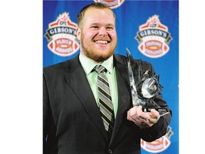 Dr. H expects Saskatchewan Roughriders guard Brendon LaBatte, shown with the CFL's lineman-of-the-year award in 2013, to enjoy another all-star season.