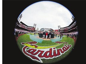 U.S. Federal law enforcement authorities are investigating whether the St. Louis Cardinals illegally hacked into a computer database of the Houston Astros, a source said Tuesday.