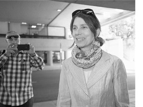 Freelance journalist Laura Robinson arrives at B.C. Supreme Court in Vancouver on June 15. Robinson alleges former Vancouver Olympics CEO John Furlong publicly portrayed her as unethical, heartless and cruel, she testified during the past week.