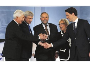 From left: Bloc Quebecois Leader Gilles Duceppe, Conservative Leader Stephen Harper, New Democratic Party Leader Tom Mulcair, Green party Leader Elizabeth May and Liberal Leader Justin Trudeau shake hands before the start of the French-language leaders' debate in Montreal on Thursday.
