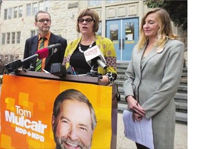 From left: Saskatoon NDP candidates Scott Bell, Sheri Benson and Claire Card announce on Thursday the federal NDP's plan to boost post-secondary grants and phase out interest payments on the federal portion of student loans over the next seven years.