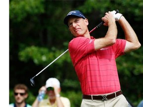 Jim Furyk tees off on the first hole during the first round of the Deutsche Bank Championship golf tournament in Norton, Mass., Friday, Sept. 4, 2015.
