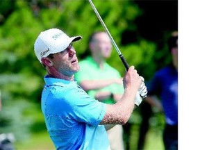 Graham DeLaet puts on a demonstration for the assembled at Riverside Golf and Country Club where the PGA golfer and his wife Ruby launched the Graham Slam Charity event on Thursday.