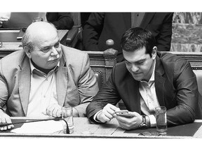 Greece's Prime Minister Alexis Tsipras, right, has steadfastly sought billions of euros more from lenders without hinting at how his government plans to balance the country's books.