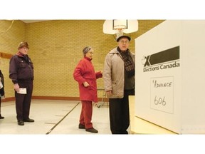 Voters attend advance polls at North Park Wilson school on Ninth Ave. during a past election in this StarPhoenix file photo. On Friday, advance polls will open for four days ahead of the Oct. 19 election. A local expert predicts an increase in the number of people heading out to cast their ballots early.